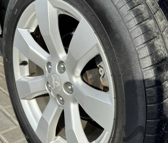 Серый Мицубиси Аутлендер, объемом двигателя 2.4 л и пробегом 239 тыс. км за 11700 $, фото 20 на Automoto.ua