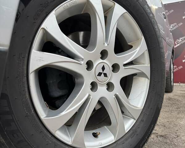 Серый Мицубиси Аутлендер, объемом двигателя 2.2 л и пробегом 190 тыс. км за 14950 $, фото 5 на Automoto.ua