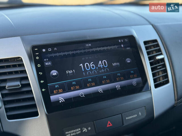 Серый Мицубиси Аутлендер, объемом двигателя 2.2 л и пробегом 171 тыс. км за 12700 $, фото 61 на Automoto.ua