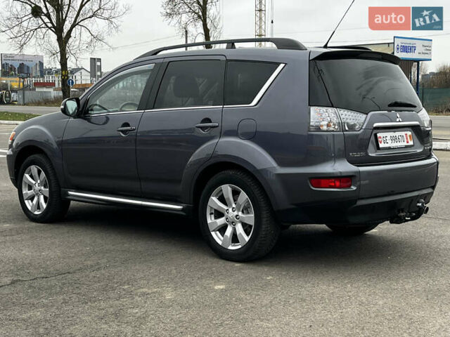 Серый Мицубиси Аутлендер, объемом двигателя 2.2 л и пробегом 206 тыс. км за 11999 $, фото 4 на Automoto.ua