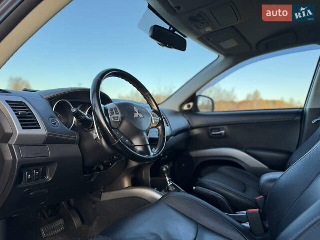 Серый Мицубиси Аутлендер, объемом двигателя 2.2 л и пробегом 171 тыс. км за 12700 $, фото 49 на Automoto.ua