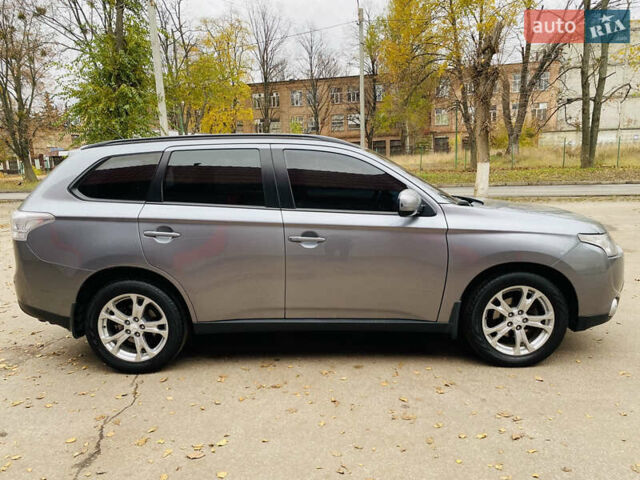Серый Мицубиси Аутлендер, объемом двигателя 2.36 л и пробегом 131 тыс. км за 11800 $, фото 12 на Automoto.ua