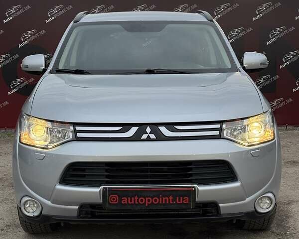 Серый Мицубиси Аутлендер, объемом двигателя 2.2 л и пробегом 190 тыс. км за 14950 $, фото 1 на Automoto.ua