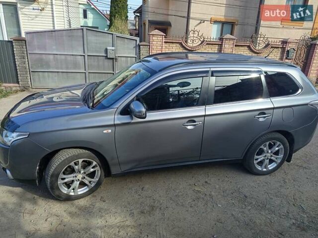 Серый Мицубиси Аутлендер, объемом двигателя 2.27 л и пробегом 240 тыс. км за 12150 $, фото 14 на Automoto.ua