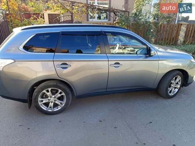 Серый Мицубиси Аутлендер, объемом двигателя 2.27 л и пробегом 240 тыс. км за 12150 $, фото 8 на Automoto.ua