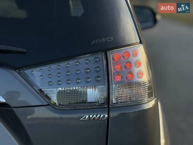 Серый Мицубиси Аутлендер, объемом двигателя 2.2 л и пробегом 171 тыс. км за 12700 $, фото 30 на Automoto.ua