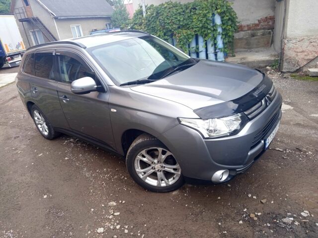 Сірий Міцубісі Аутлендер, об'ємом двигуна 2.3 л та пробігом 248 тис. км за 11550 $, фото 4 на Automoto.ua