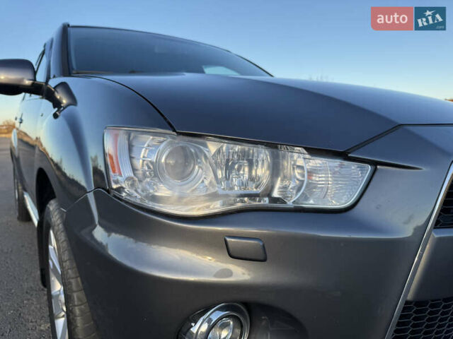 Серый Мицубиси Аутлендер, объемом двигателя 2.2 л и пробегом 171 тыс. км за 12700 $, фото 16 на Automoto.ua