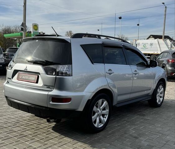 Серый Мицубиси Аутлендер, объемом двигателя 2.4 л и пробегом 239 тыс. км за 11700 $, фото 3 на Automoto.ua