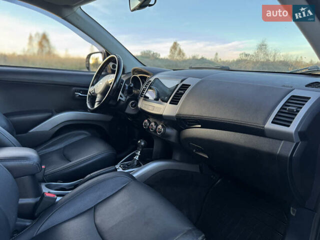 Серый Мицубиси Аутлендер, объемом двигателя 2.2 л и пробегом 171 тыс. км за 12700 $, фото 76 на Automoto.ua