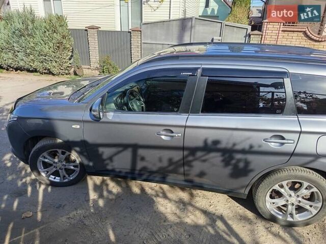 Серый Мицубиси Аутлендер, объемом двигателя 2.27 л и пробегом 240 тыс. км за 12150 $, фото 10 на Automoto.ua