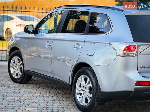 Серый Мицубиси Аутлендер, объемом двигателя 2.2 л и пробегом 189 тыс. км за 12800 $, фото 20 на Automoto.ua