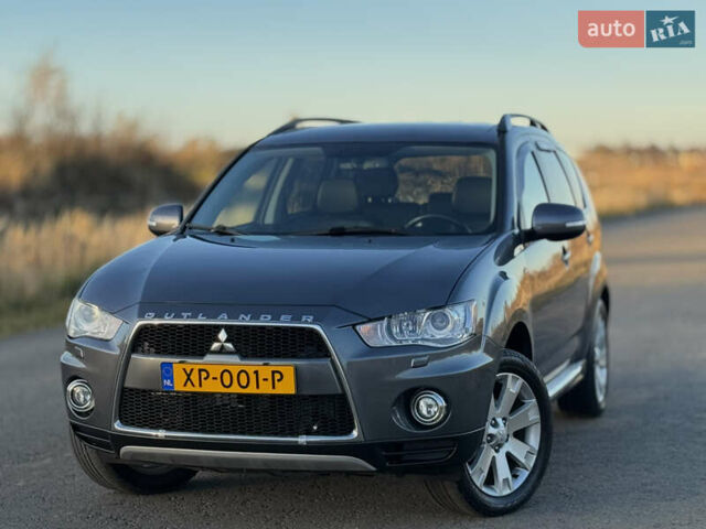 Серый Мицубиси Аутлендер, объемом двигателя 2.2 л и пробегом 171 тыс. км за 12700 $, фото 2 на Automoto.ua