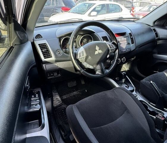 Серый Мицубиси Аутлендер, объемом двигателя 2.4 л и пробегом 239 тыс. км за 11700 $, фото 9 на Automoto.ua