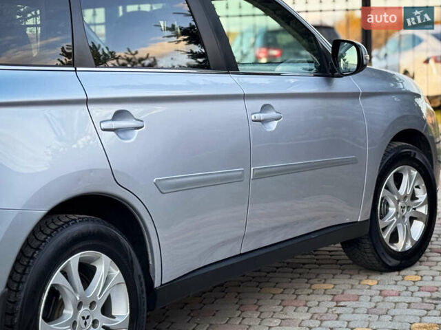 Серый Мицубиси Аутлендер, объемом двигателя 2.2 л и пробегом 189 тыс. км за 12800 $, фото 27 на Automoto.ua