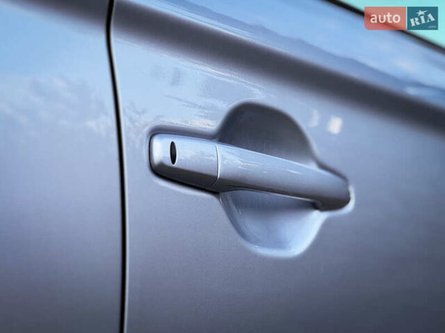 Серый Мицубиси Аутлендер, объемом двигателя 2.2 л и пробегом 189 тыс. км за 12800 $, фото 28 на Automoto.ua