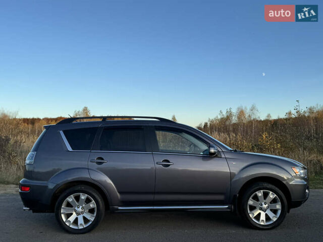 Серый Мицубиси Аутлендер, объемом двигателя 2.2 л и пробегом 171 тыс. км за 12700 $, фото 33 на Automoto.ua