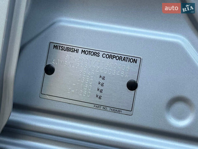 Серый Мицубиси Аутлендер, объемом двигателя 2.2 л и пробегом 188 тыс. км за 13500 $, фото 26 на Automoto.ua