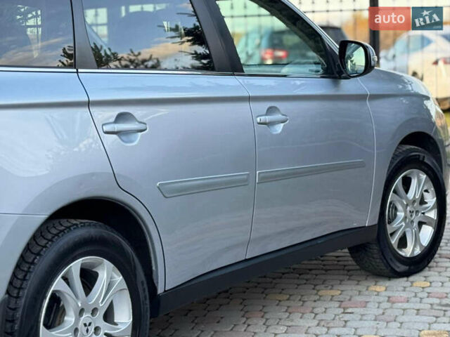 Серый Мицубиси Аутлендер, объемом двигателя 2.2 л и пробегом 188 тыс. км за 13500 $, фото 18 на Automoto.ua