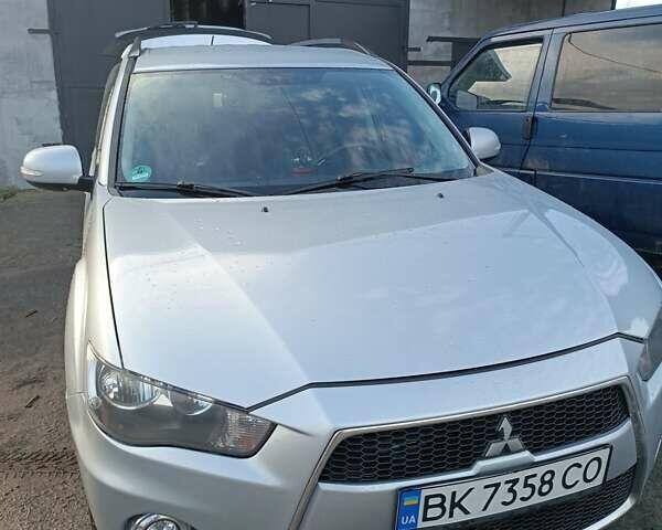 Мицубиси Аутлендер 2012 в Стрые на Automoto.ua Серый Мицубиси Аутлендер, объемом двигателя 2.3 л и пробегом 246 тыс. км за 12200 $, фото 3 на Automoto.ua