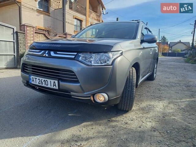 Серый Мицубиси Аутлендер, объемом двигателя 2.27 л и пробегом 240 тыс. км за 12150 $, фото 2 на Automoto.ua