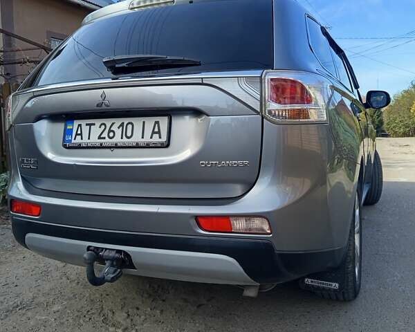 Серый Мицубиси Аутлендер, объемом двигателя 2.27 л и пробегом 240 тыс. км за 12150 $, фото 6 на Automoto.ua