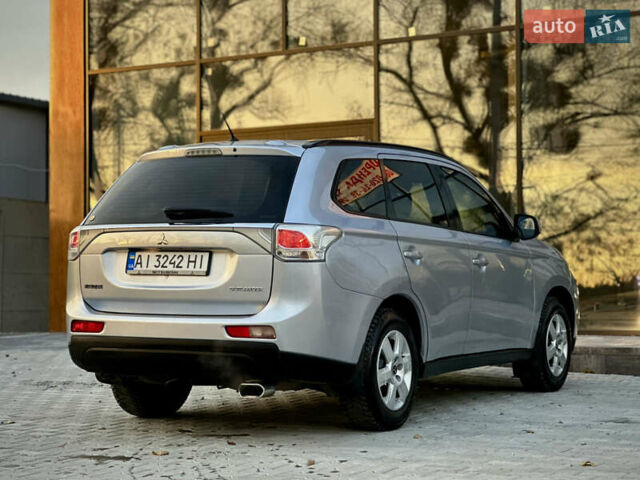 Сірий Міцубісі Аутлендер, об'ємом двигуна 2.36 л та пробігом 225 тис. км за 10500 $, фото 4 на Automoto.ua