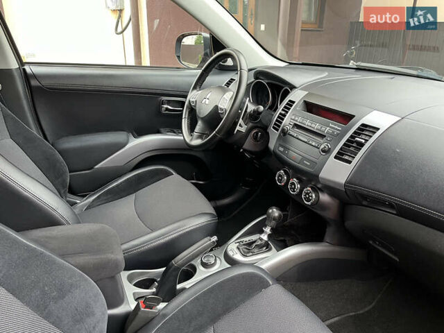 Серый Мицубиси Аутлендер, объемом двигателя 2.2 л и пробегом 186 тыс. км за 12350 $, фото 48 на Automoto.ua