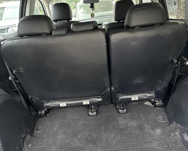 Серый Мицубиси Аутлендер, объемом двигателя 2.27 л и пробегом 207 тыс. км за 11000 $, фото 6 на Automoto.ua