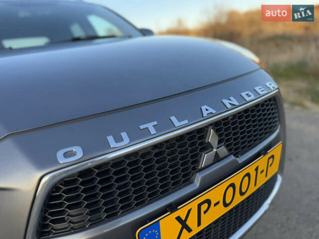 Серый Мицубиси Аутлендер, объемом двигателя 2.2 л и пробегом 171 тыс. км за 12700 $, фото 18 на Automoto.ua