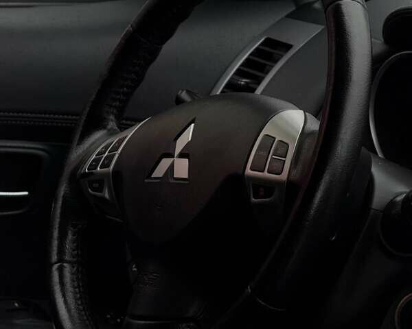 Серый Мицубиси Аутлендер, объемом двигателя 2.3 л и пробегом 160 тыс. км за 13900 $, фото 11 на Automoto.ua