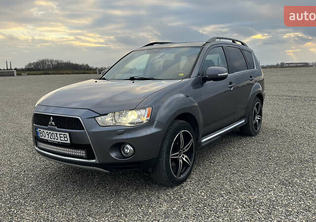 Сірий Міцубісі Аутлендер, об'ємом двигуна 2.2 л та пробігом 280 тис. км за 11100 $, фото 1 на Automoto.ua