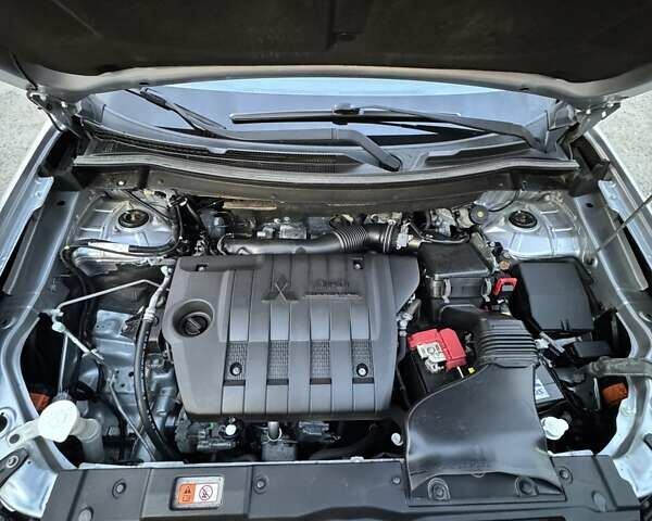 Серый Мицубиси Аутлендер, объемом двигателя 2.2 л и пробегом 190 тыс. км за 14950 $, фото 36 на Automoto.ua