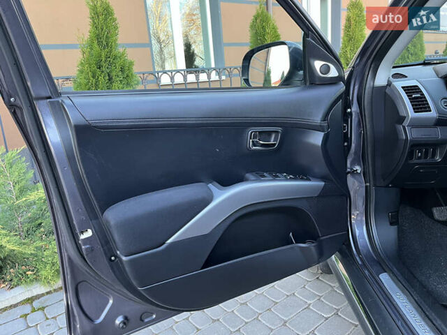 Серый Мицубиси Аутлендер, объемом двигателя 2.2 л и пробегом 186 тыс. км за 12350 $, фото 49 на Automoto.ua