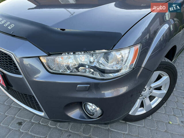 Серый Мицубиси Аутлендер, объемом двигателя 2.2 л и пробегом 186 тыс. км за 12350 $, фото 14 на Automoto.ua