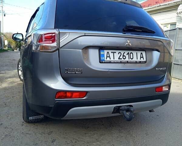 Серый Мицубиси Аутлендер, объемом двигателя 2.27 л и пробегом 240 тыс. км за 12150 $, фото 12 на Automoto.ua