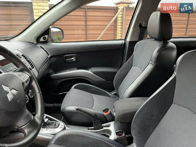 Серый Мицубиси Аутлендер, объемом двигателя 2.2 л и пробегом 186 тыс. км за 12350 $, фото 42 на Automoto.ua