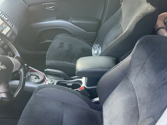 Серый Мицубиси Аутлендер, объемом двигателя 2 л и пробегом 136 тыс. км за 14999 $, фото 1 на Automoto.ua