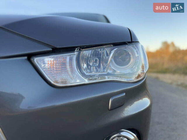 Серый Мицубиси Аутлендер, объемом двигателя 2.2 л и пробегом 171 тыс. км за 12700 $, фото 19 на Automoto.ua