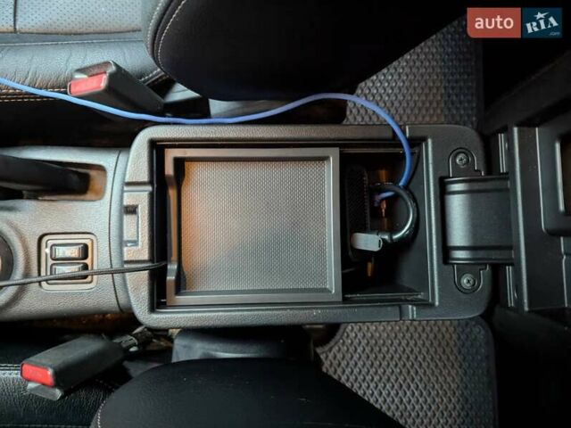 Серый Мицубиси Аутлендер, объемом двигателя 2.27 л и пробегом 232 тыс. км за 12500 $, фото 21 на Automoto.ua