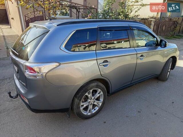 Серый Мицубиси Аутлендер, объемом двигателя 2.27 л и пробегом 240 тыс. км за 12150 $, фото 7 на Automoto.ua