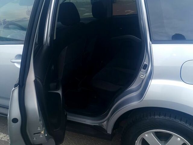 Серый Мицубиси Аутлендер, объемом двигателя 2 л и пробегом 203 тыс. км за 12000 $, фото 7 на Automoto.ua