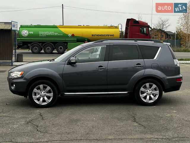 Серый Мицубиси Аутлендер, объемом двигателя 2.2 л и пробегом 206 тыс. км за 11999 $, фото 3 на Automoto.ua