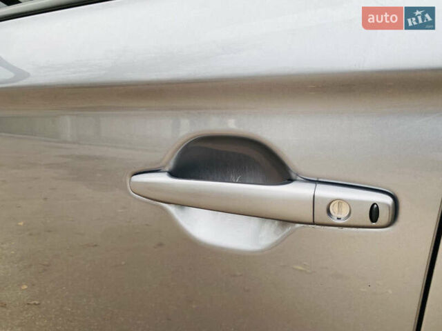 Серый Мицубиси Аутлендер, объемом двигателя 2.36 л и пробегом 131 тыс. км за 11800 $, фото 16 на Automoto.ua