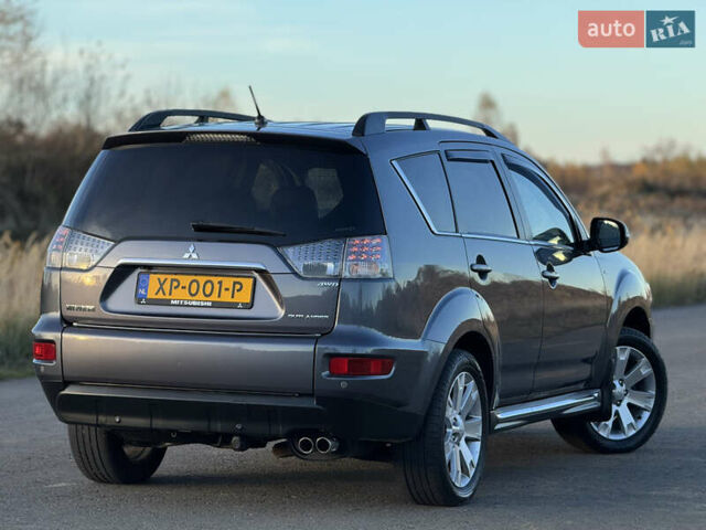 Серый Мицубиси Аутлендер, объемом двигателя 2.2 л и пробегом 171 тыс. км за 12700 $, фото 40 на Automoto.ua