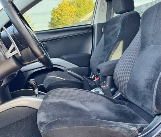 Серый Мицубиси Аутлендер, объемом двигателя 2.4 л и пробегом 239 тыс. км за 11700 $, фото 11 на Automoto.ua