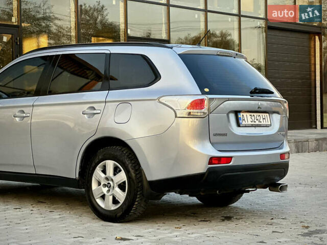 Сірий Міцубісі Аутлендер, об'ємом двигуна 2.36 л та пробігом 225 тис. км за 10500 $, фото 8 на Automoto.ua