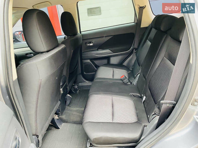 Серый Мицубиси Аутлендер, объемом двигателя 2.36 л и пробегом 131 тыс. км за 11800 $, фото 9 на Automoto.ua