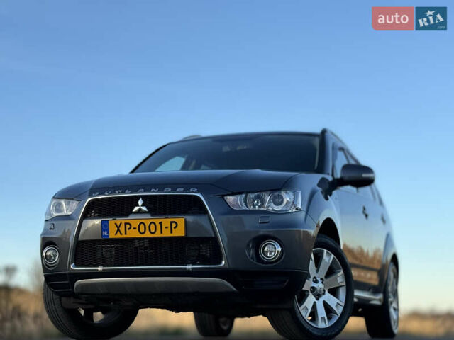 Серый Мицубиси Аутлендер, объемом двигателя 2.2 л и пробегом 171 тыс. км за 12700 $, фото 3 на Automoto.ua