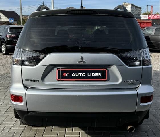 Серый Мицубиси Аутлендер, объемом двигателя 2.4 л и пробегом 239 тыс. км за 11700 $, фото 4 на Automoto.ua